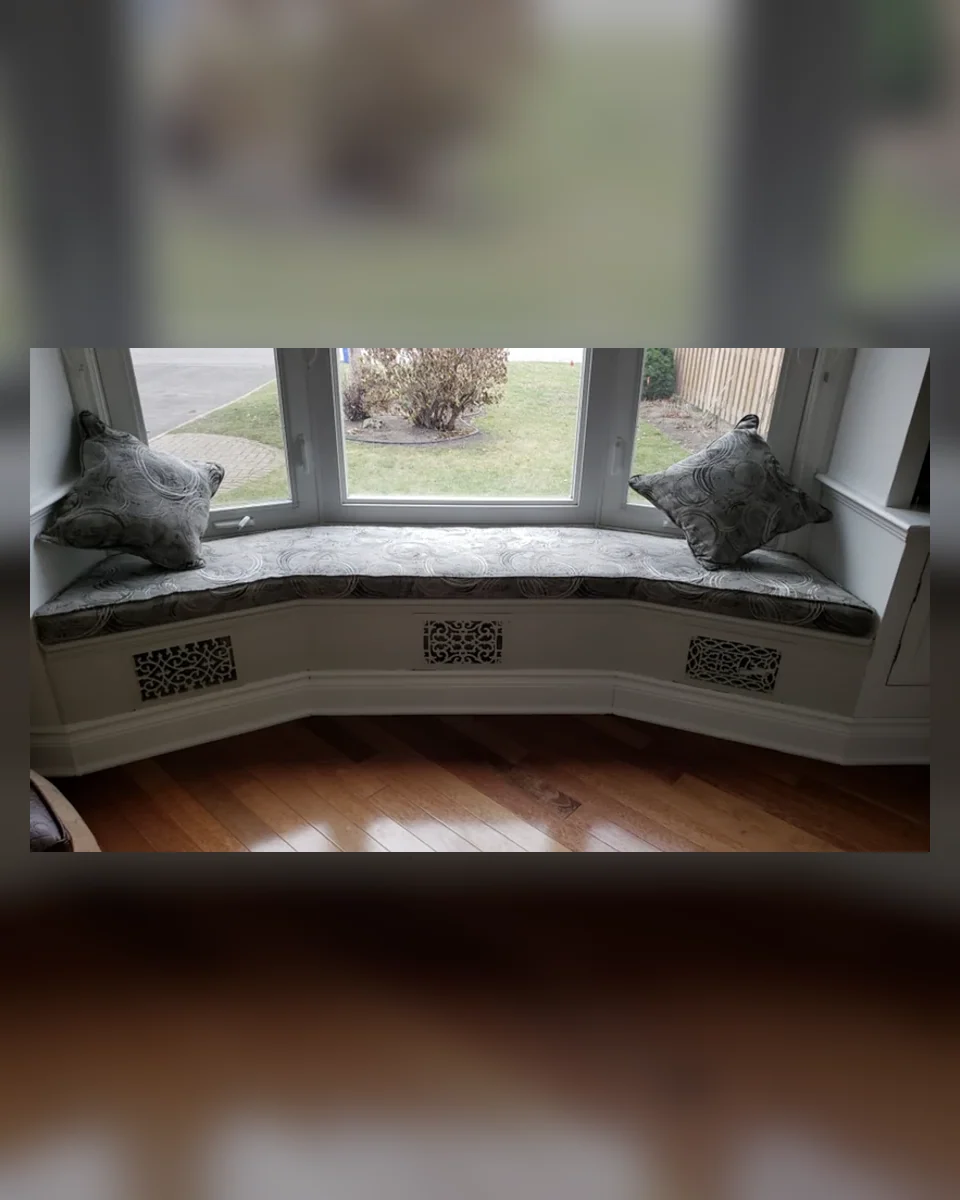 Residential bay window seating restored by Nora’s Upholstery